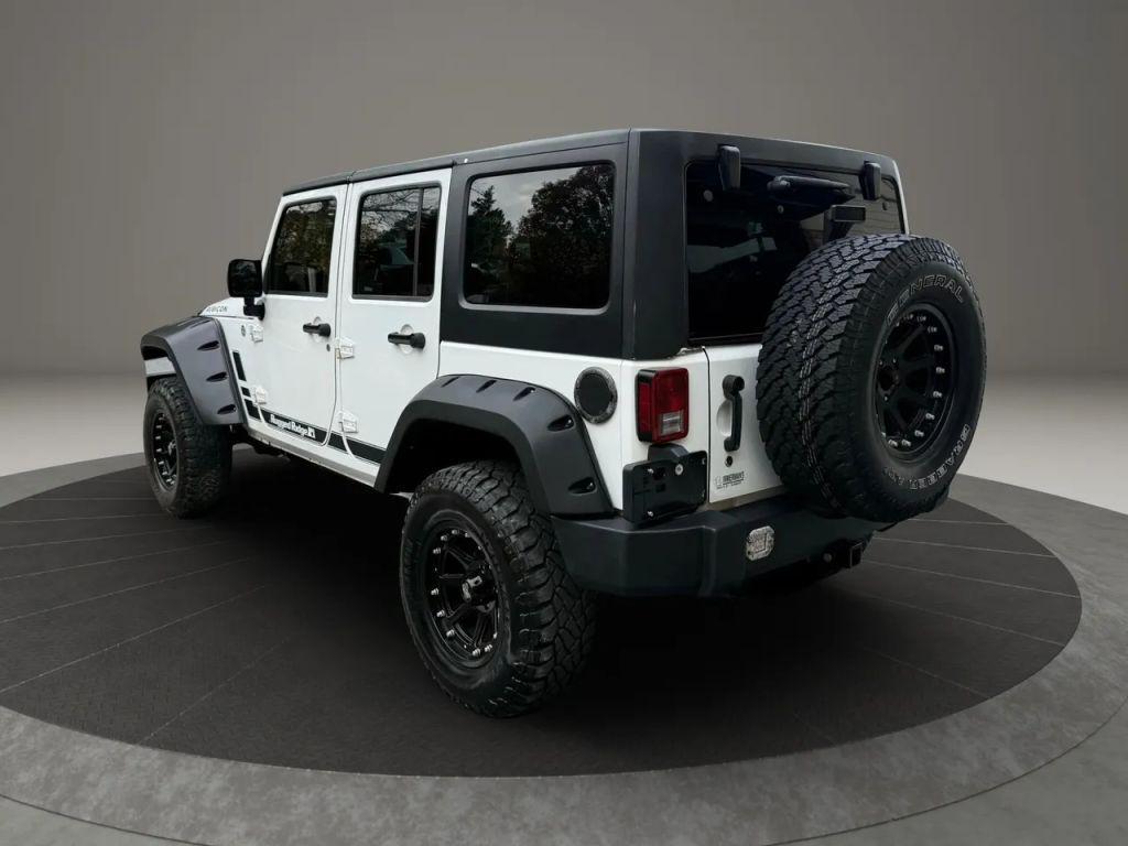 used 2012 Jeep Wrangler Unlimited car, priced at $13,499