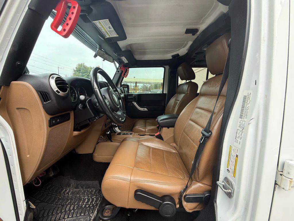 used 2012 Jeep Wrangler Unlimited car, priced at $13,499