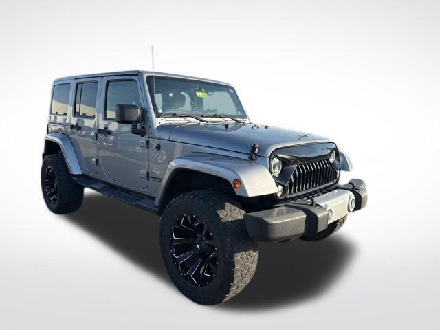 used 2014 Jeep Wrangler Unlimited car, priced at $15,500