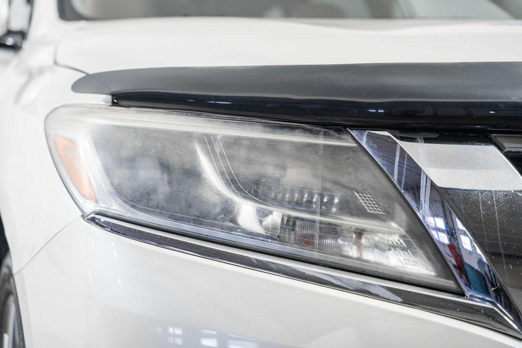 used 2015 Nissan Pathfinder car, priced at $9,000