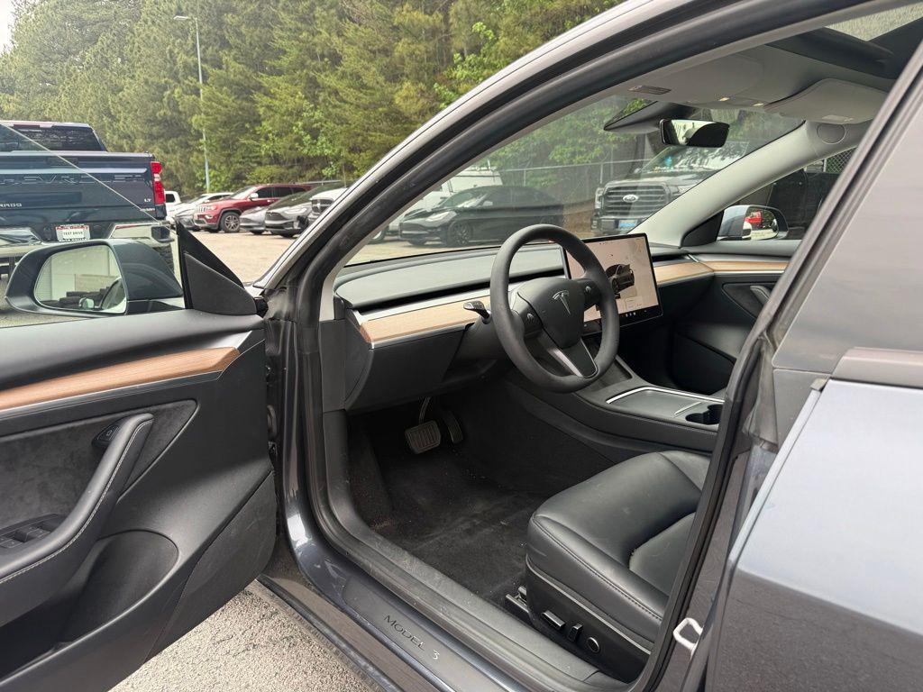 used 2023 Tesla Model 3 car, priced at $28,500