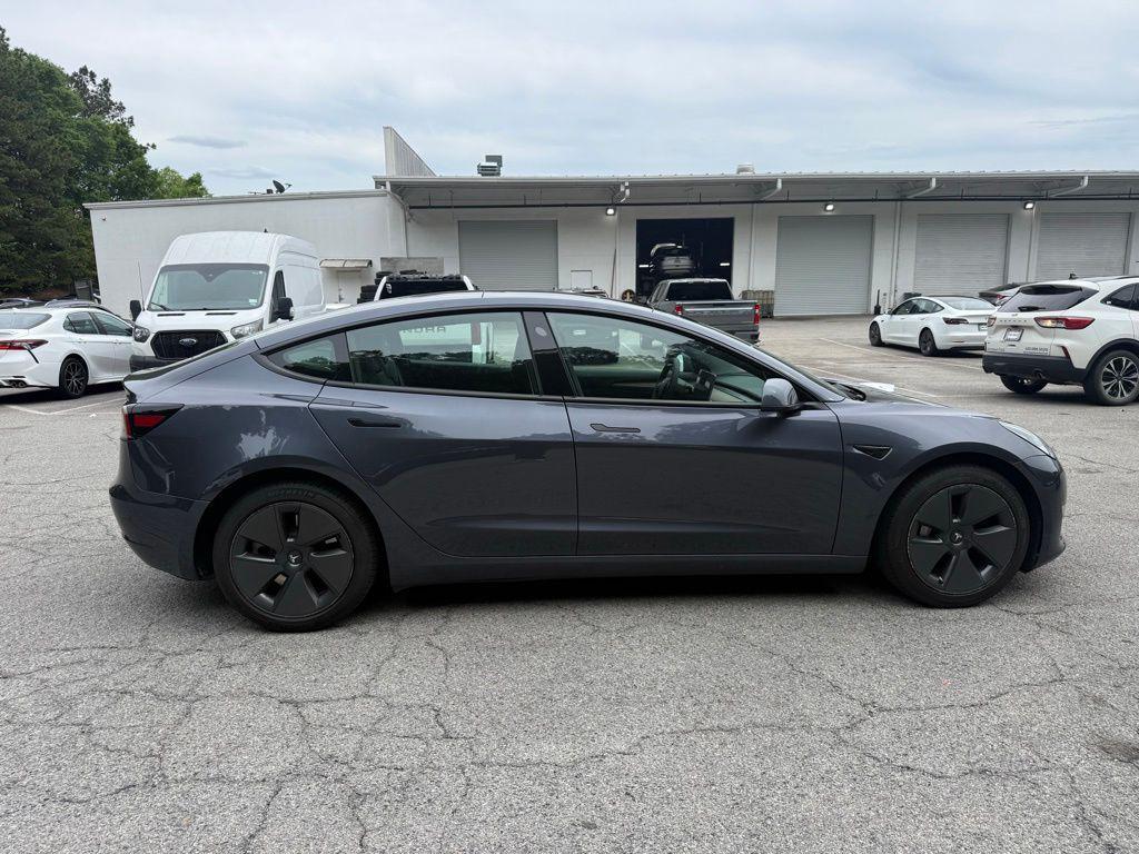 used 2023 Tesla Model 3 car, priced at $28,500