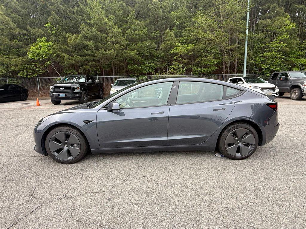 used 2023 Tesla Model 3 car, priced at $28,500