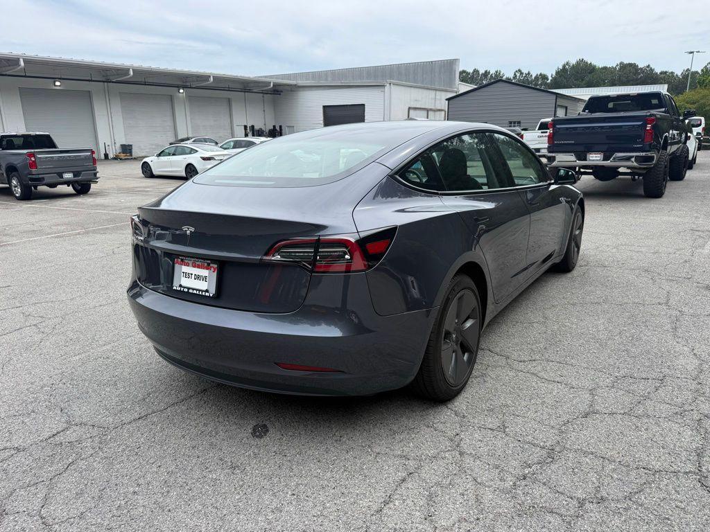 used 2023 Tesla Model 3 car, priced at $28,500