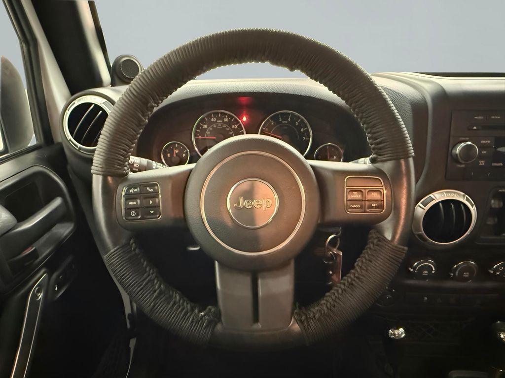 used 2012 Jeep Wrangler Unlimited car, priced at $15,995