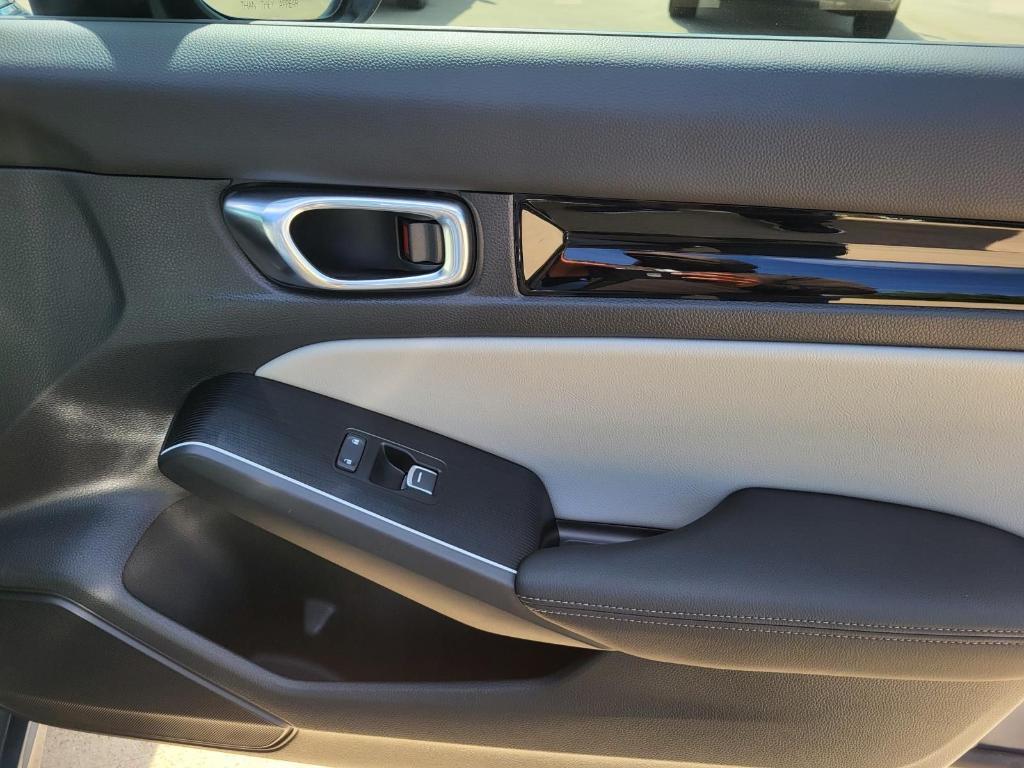 used 2025 Honda Civic Hybrid car, priced at $30,026