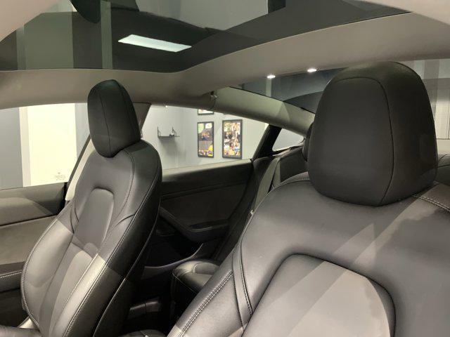 used 2023 Tesla Model 3 car, priced at $27,476