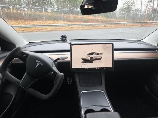 used 2023 Tesla Model 3 car, priced at $19,995