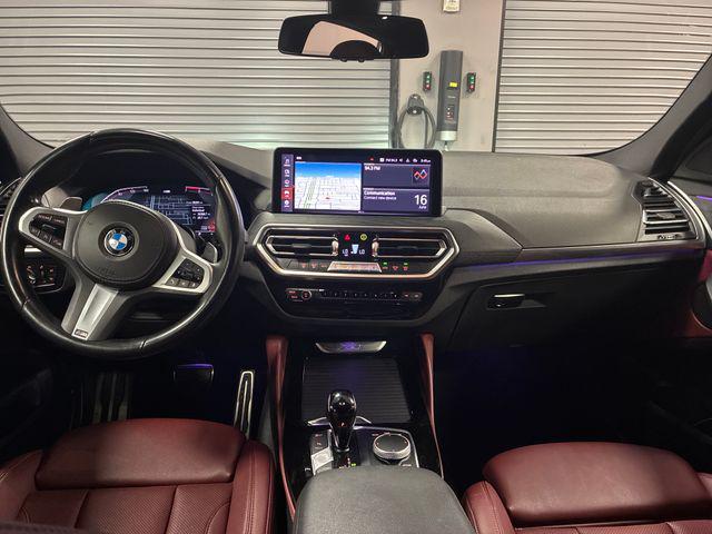 used 2023 BMW X4 car, priced at $42,891