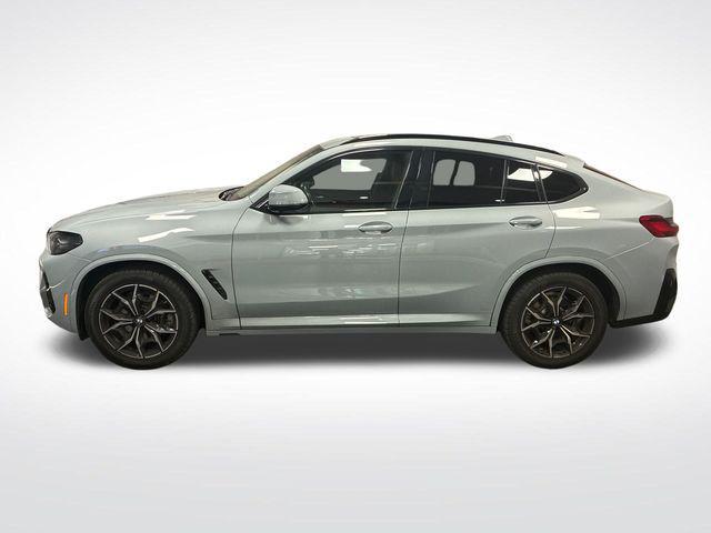 used 2023 BMW X4 car, priced at $42,891