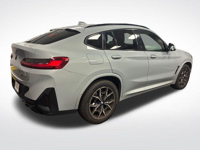 used 2023 BMW X4 car, priced at $42,891