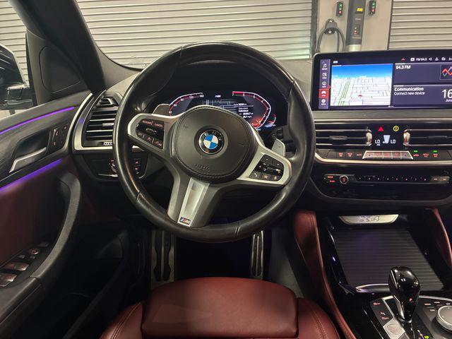 used 2023 BMW X4 car, priced at $42,891