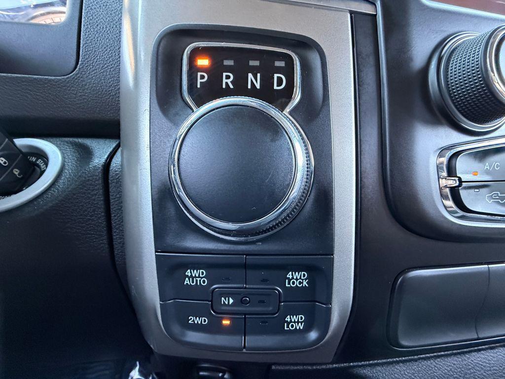 used 2018 Ram 1500 car, priced at $23,611
