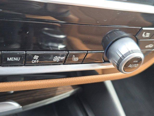 used 2023 BMW 530e car, priced at $32,848