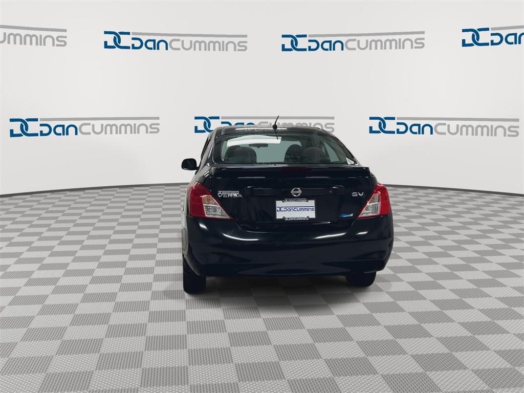 used 2013 Nissan Versa car, priced at $2,300