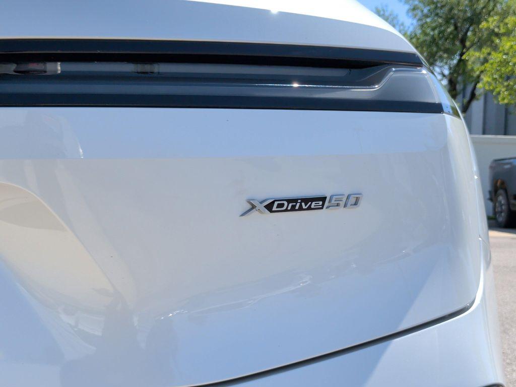 used 2024 BMW iX car, priced at $56,140