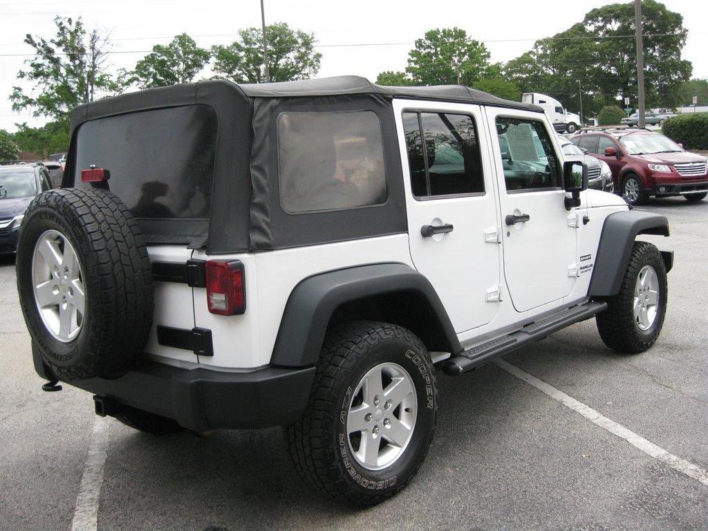 used 2013 Jeep Wrangler Unlimited car, priced at $13,449