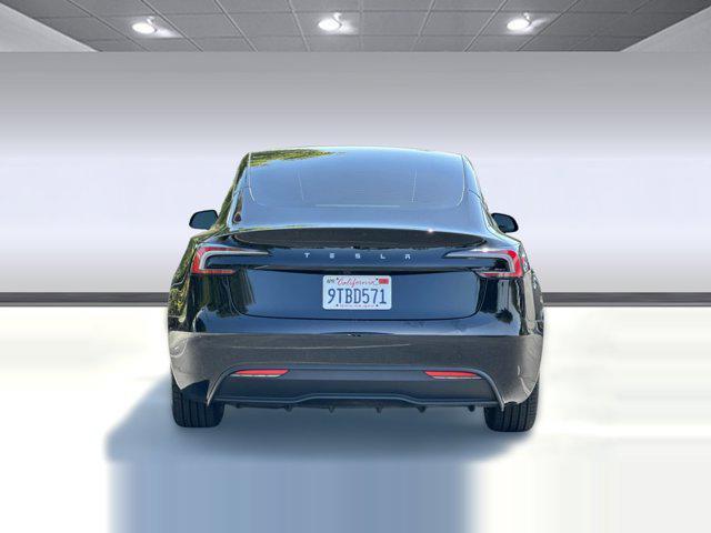 used 2025 Tesla Model 3 car, priced at $34,999
