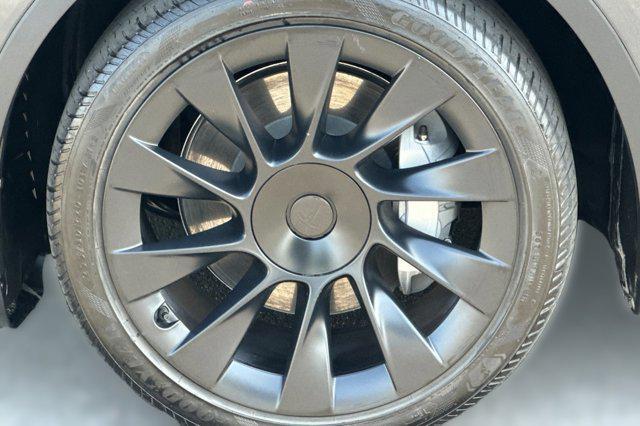 used 2024 Tesla Model Y car, priced at $34,499