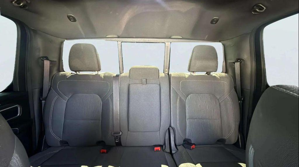 used 2021 Ram 1500 car, priced at $26,988