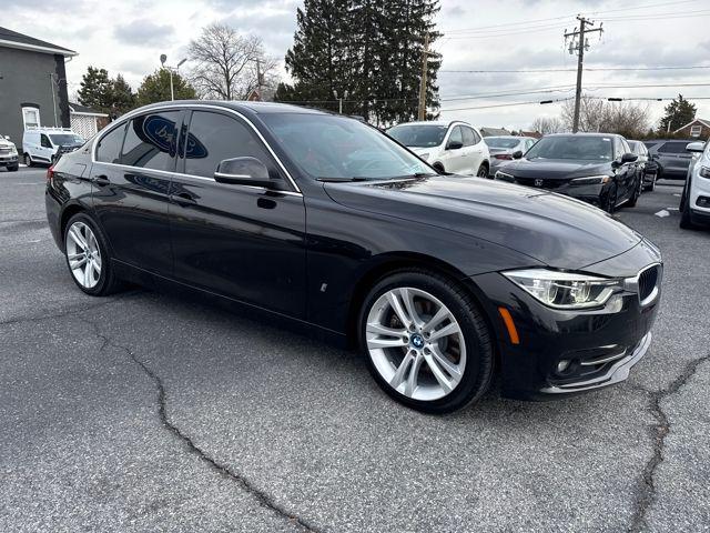 used 2018 BMW 330e car, priced at $13,273