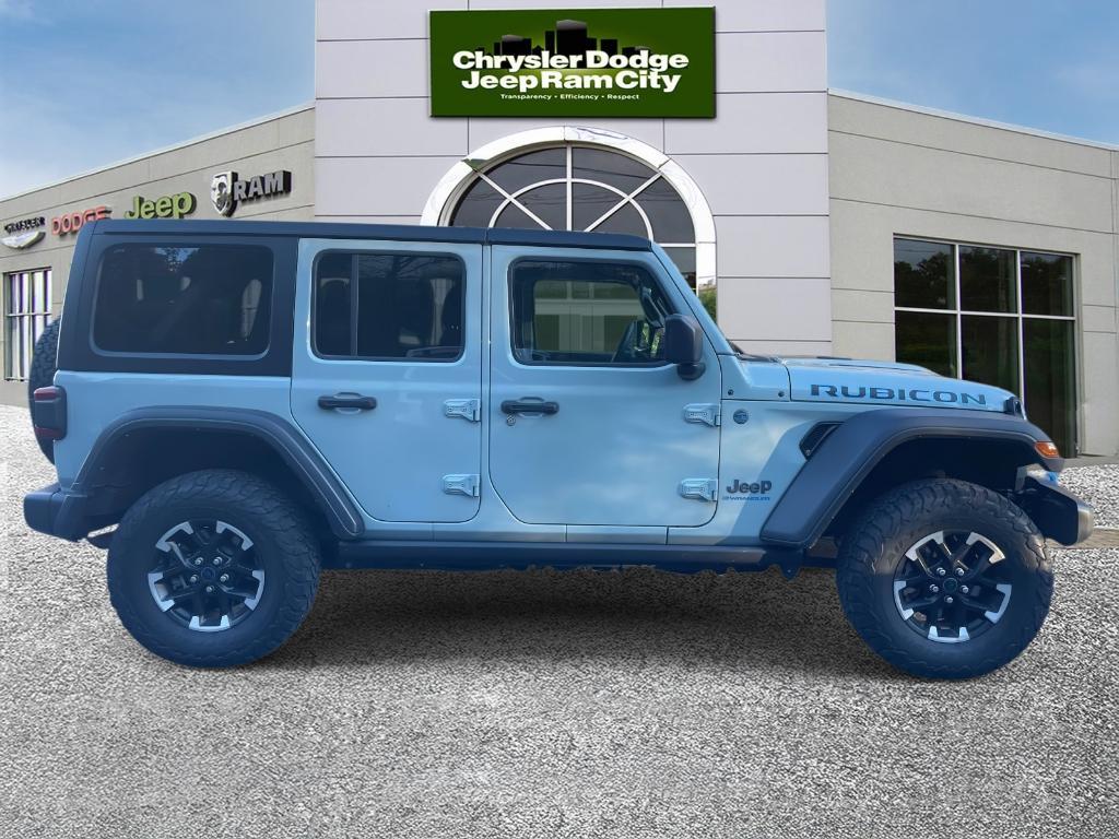 used 2024 Jeep Wrangler 4xe car, priced at $35,299