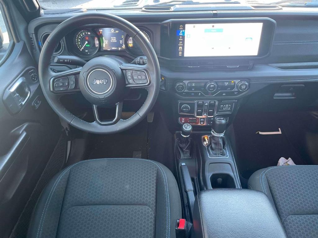 used 2024 Jeep Wrangler 4xe car, priced at $35,299
