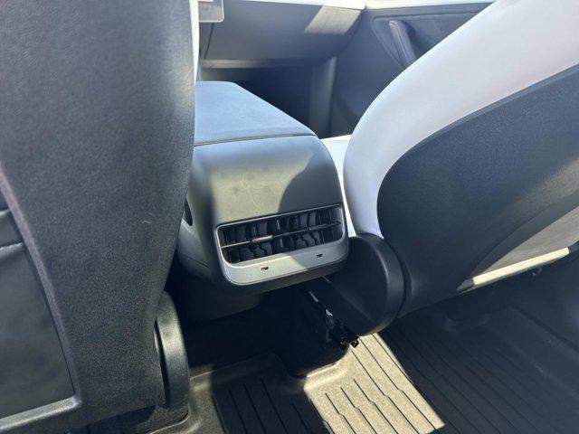 used 2024 Tesla Model Y car, priced at $34,990