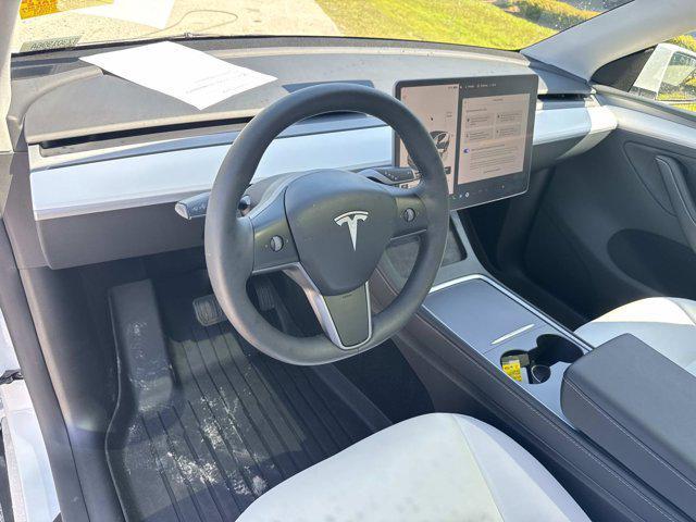 used 2024 Tesla Model Y car, priced at $34,990