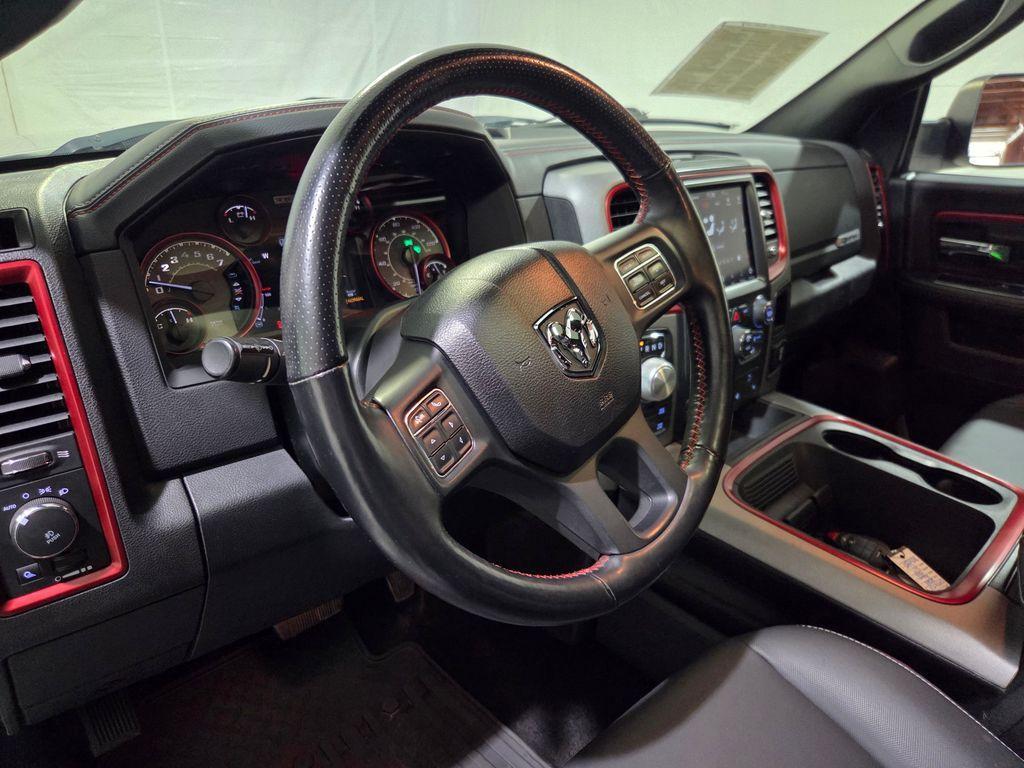 used 2018 Ram 1500 car, priced at $28,377