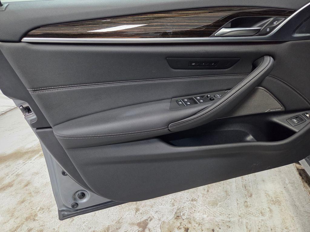 used 2023 BMW 530e car, priced at $38,000