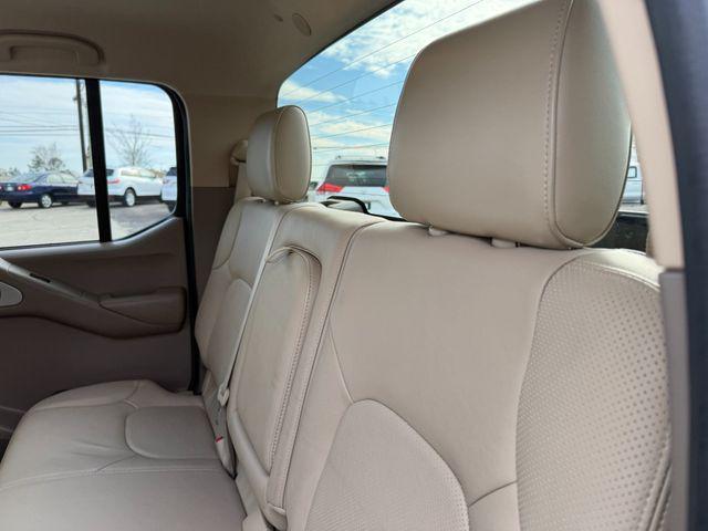 used 2010 Nissan Frontier car, priced at $16,999