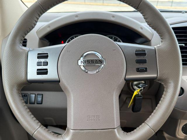 used 2010 Nissan Frontier car, priced at $16,999