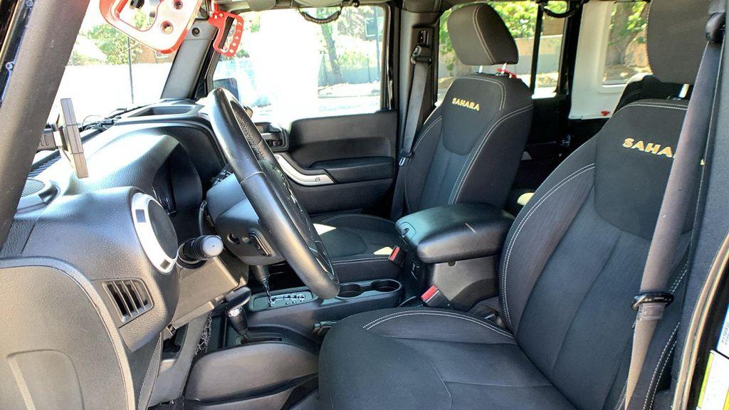 used 2015 Jeep Wrangler Unlimited car, priced at $25,398