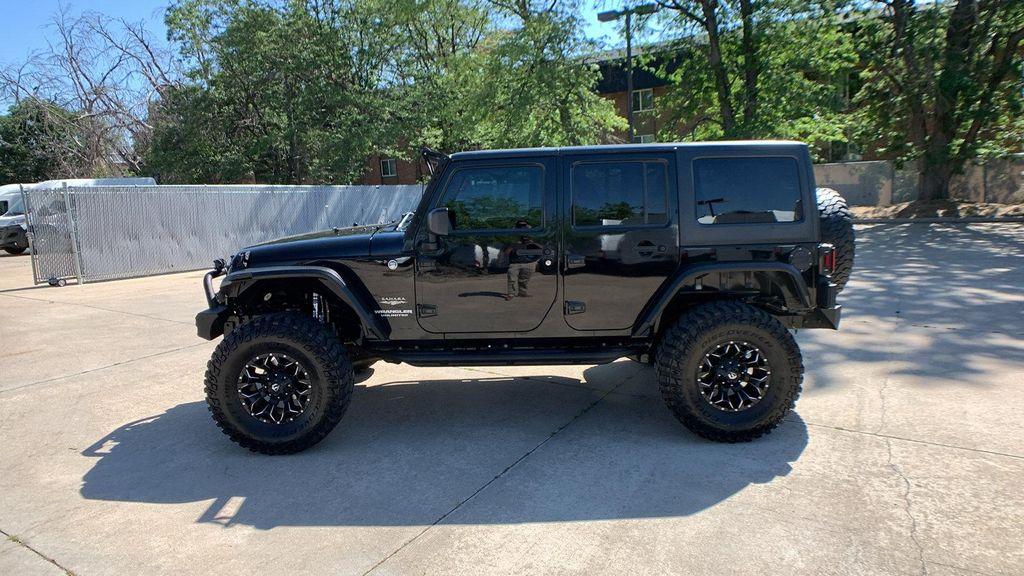used 2015 Jeep Wrangler Unlimited car, priced at $25,398