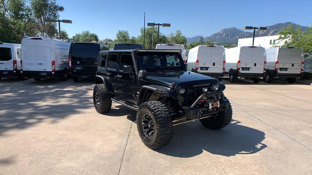 used 2015 Jeep Wrangler Unlimited car, priced at $25,398