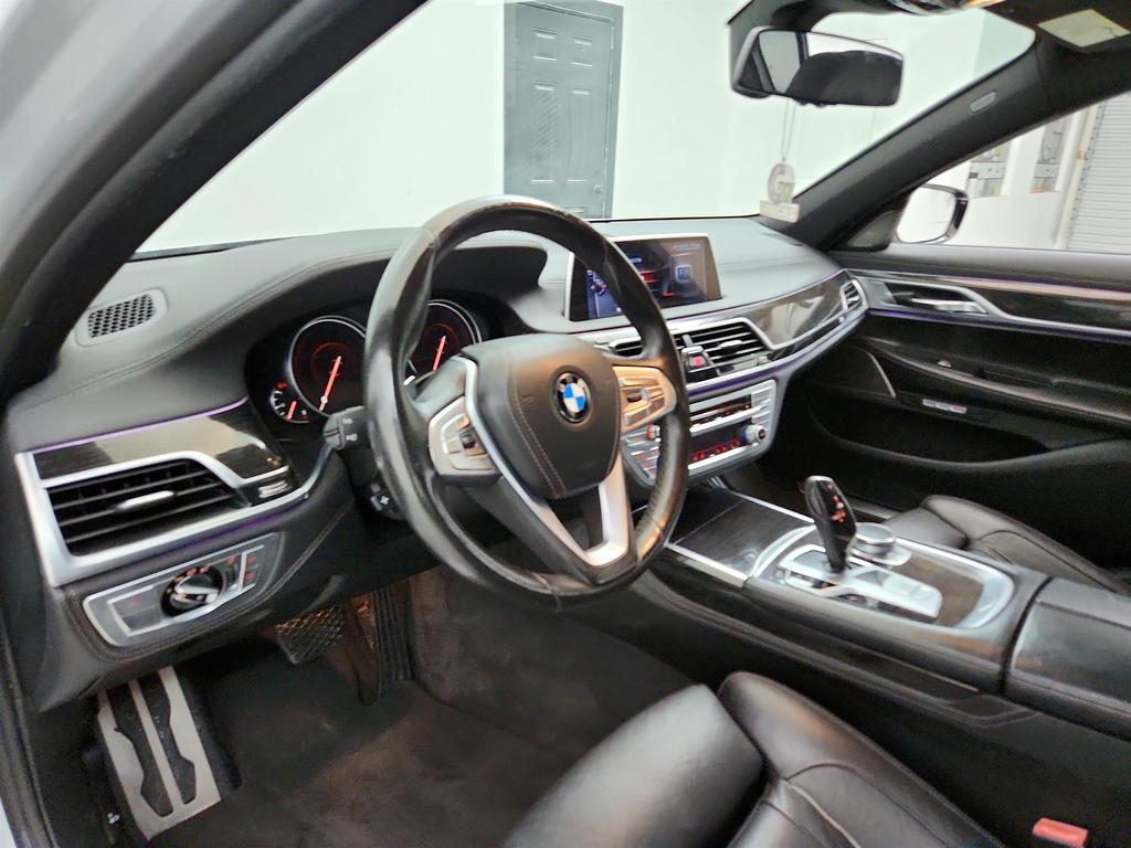 used 2016 BMW 750 car, priced at $18,095