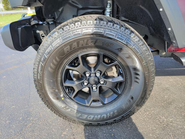 used 2021 Jeep Wrangler Unlimited car, priced at $23,876