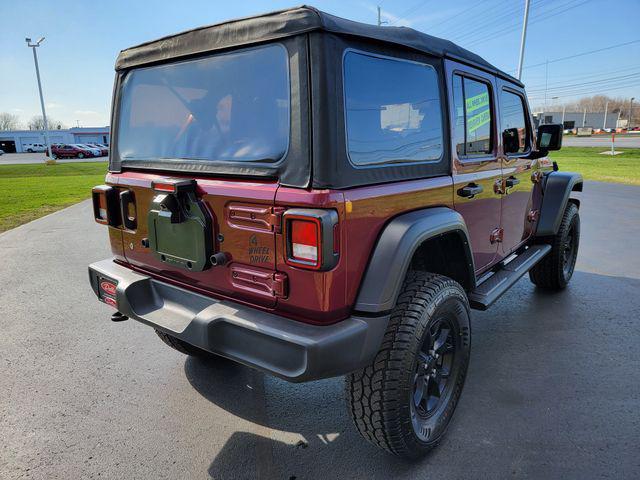 used 2021 Jeep Wrangler Unlimited car, priced at $23,876