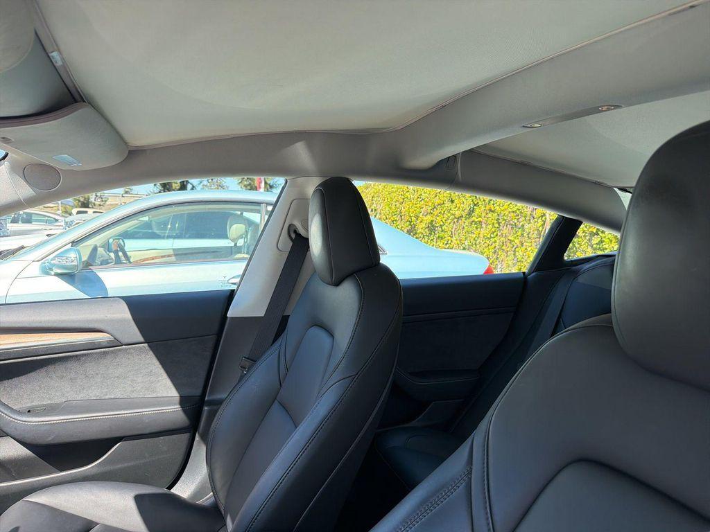 used 2023 Tesla Model 3 car, priced at $27,588