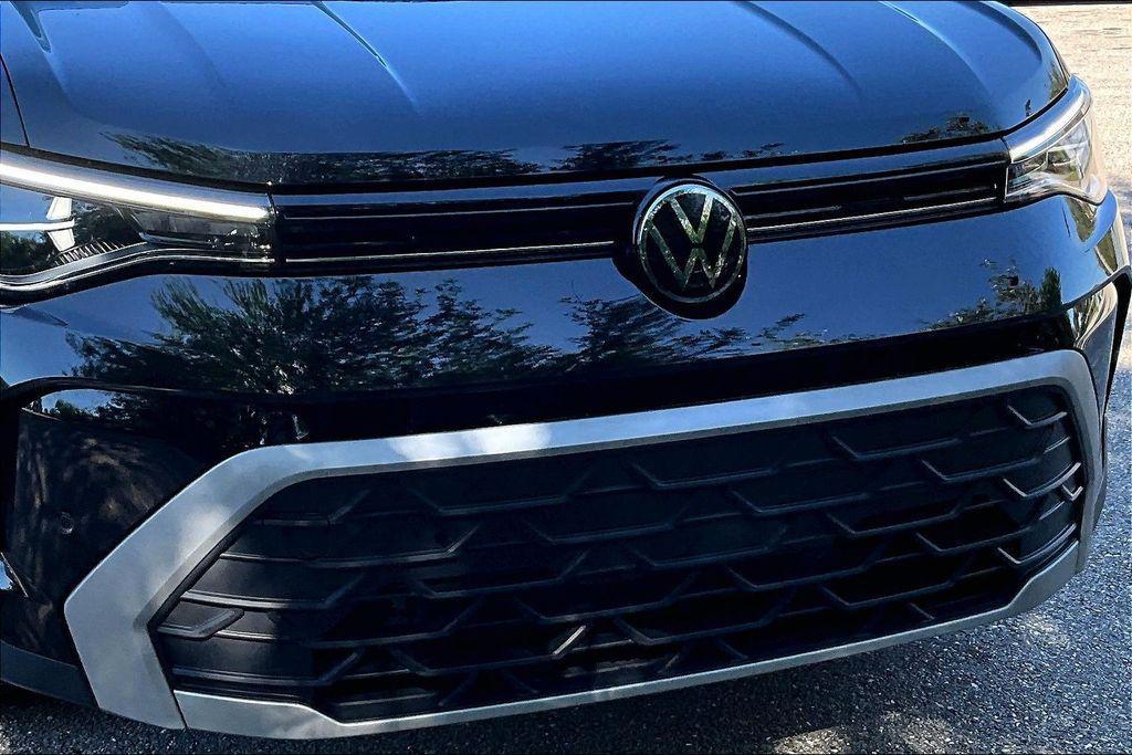 used 2025 Volkswagen Taos car, priced at $23,750