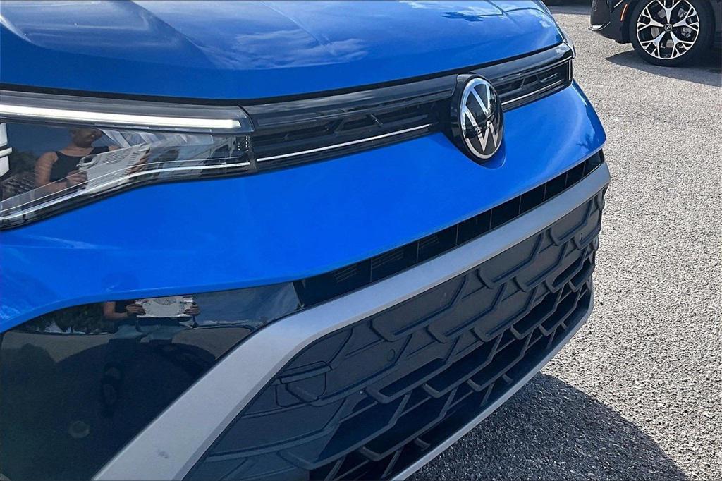 used 2025 Volkswagen Taos car, priced at $24,250
