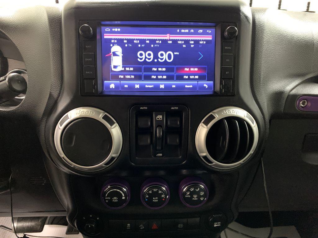 used 2011 Jeep Wrangler Unlimited car, priced at $11,624