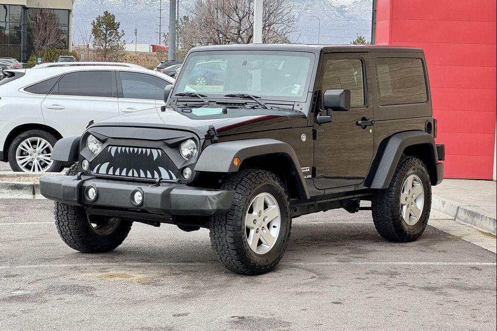 used 2015 Jeep Wrangler car, priced at $11,995