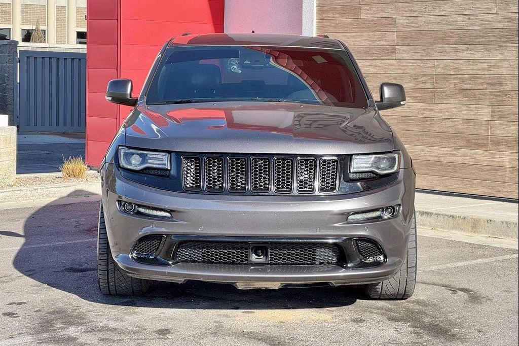used 2014 Jeep Grand Cherokee car, priced at $26,495