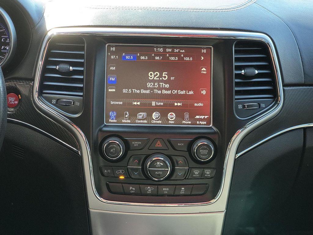 used 2014 Jeep Grand Cherokee car, priced at $26,495