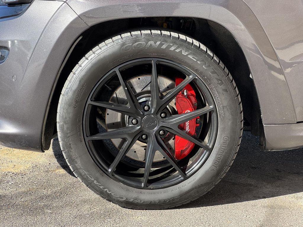 used 2014 Jeep Grand Cherokee car, priced at $26,495