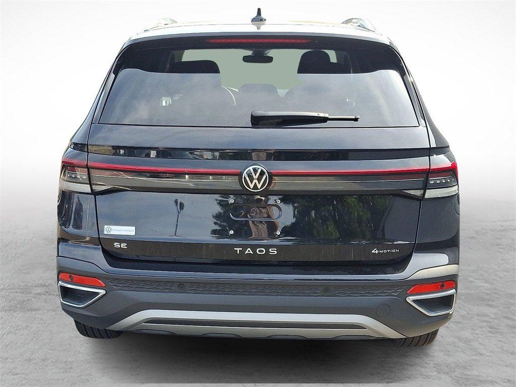 used 2025 Volkswagen Taos car, priced at $27,895