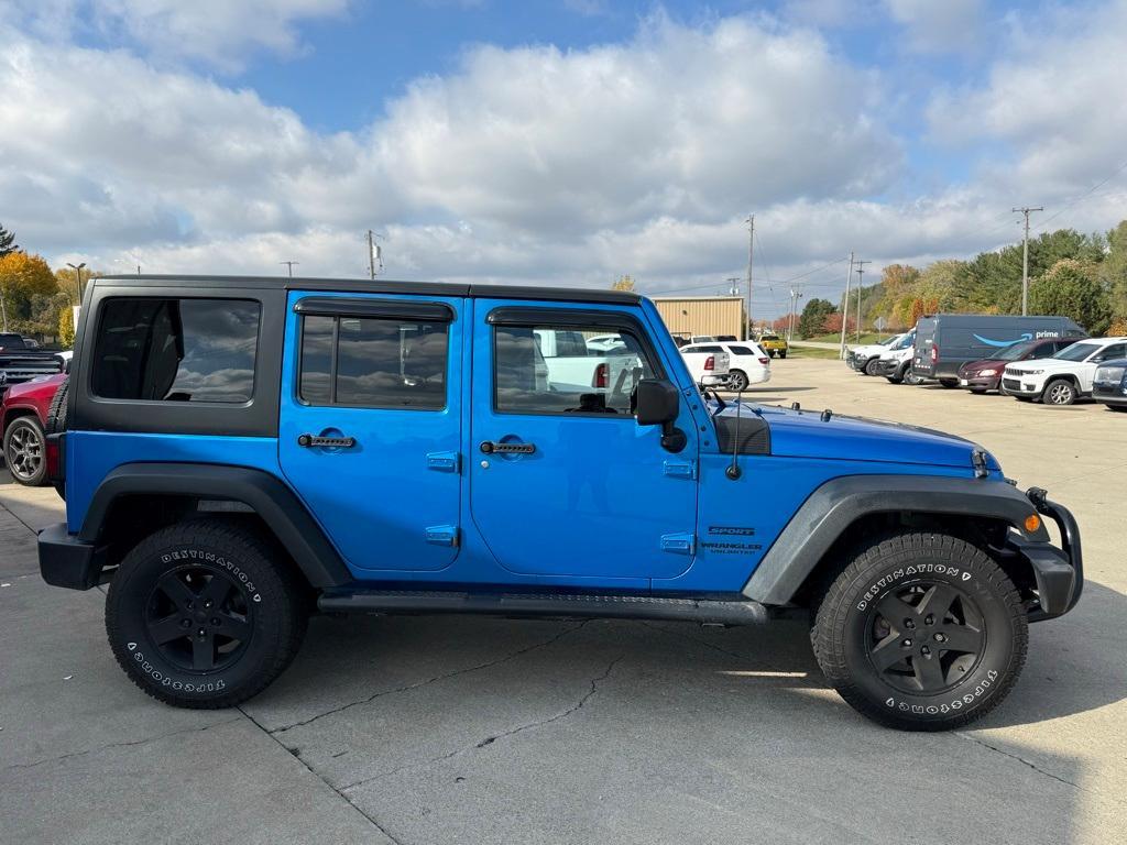 used 2015 Jeep Wrangler Unlimited car, priced at $14,554