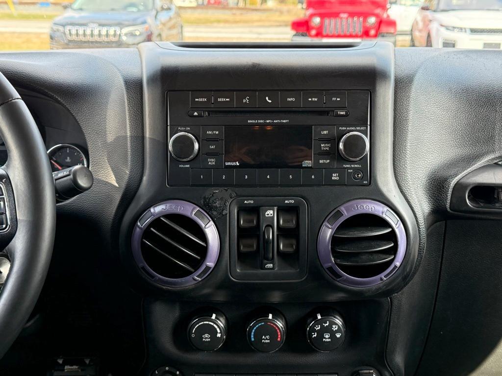 used 2015 Jeep Wrangler Unlimited car, priced at $14,554